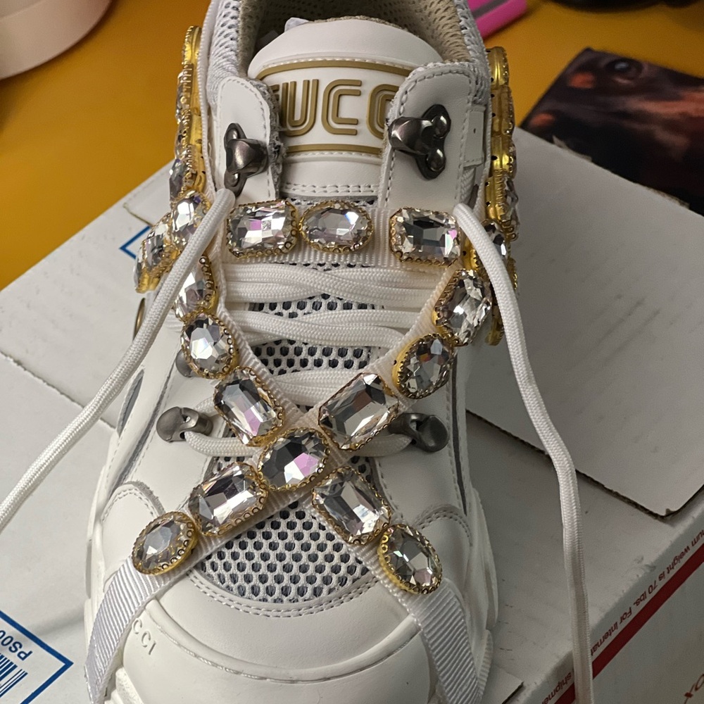 Brand-New never worn. Beautiful shoe w/removable strap embellishment.